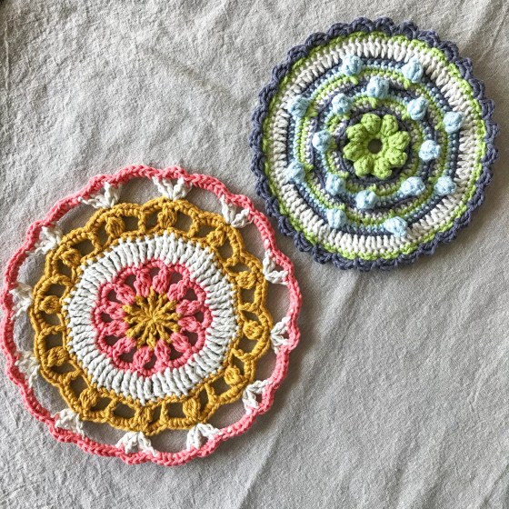 Crochet mandalas made using patterns from the book Round and Round the crochet hook
